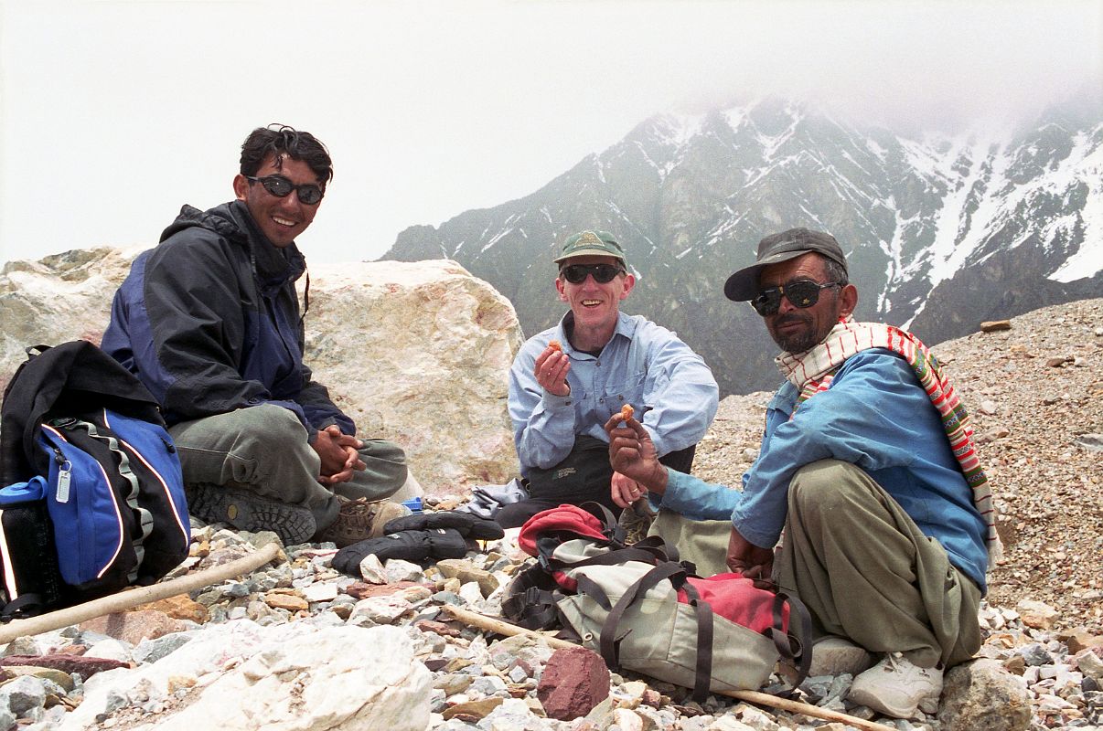 19 Guide Iqbal, Jerome Ryan, Sirdar Ali Naqi Having Lunch At Gasherbrum Base Camp My guide Iqbal, Jerome Ryan, and my sirdar Ali Naqi stopped for a quick lunch at Gasherbrum Base Camp before heading back to Shagring camp.